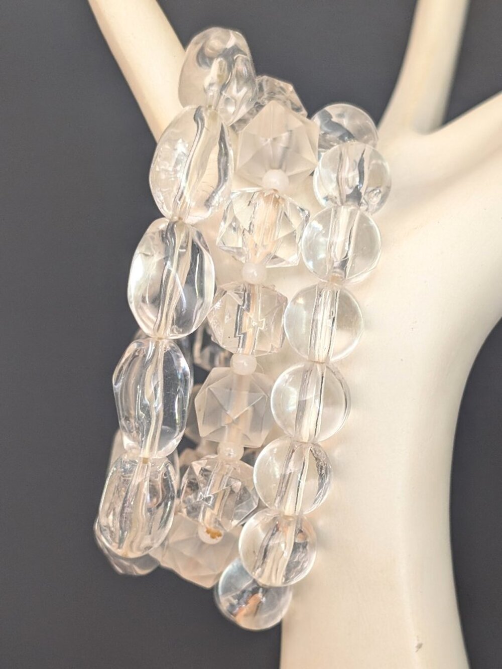 Bundle of clear layering stretch bracelets